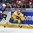 BUFFALO, NEW YORK - JANUARY 4: Sweden's Tim Soderlund #9 plays the puck while USA's Scott Perunovich #15 looks on during semifinal round action at the 2018 IIHF World Junior Championship. (Photo by Matt Zambonin/HHOF-IIHF Images)

